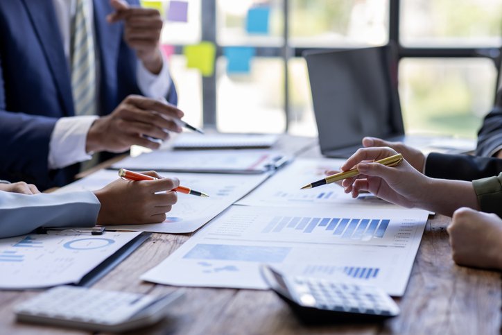 A mutual fund pools investor money to build a diversified portfolio that spreads risk.